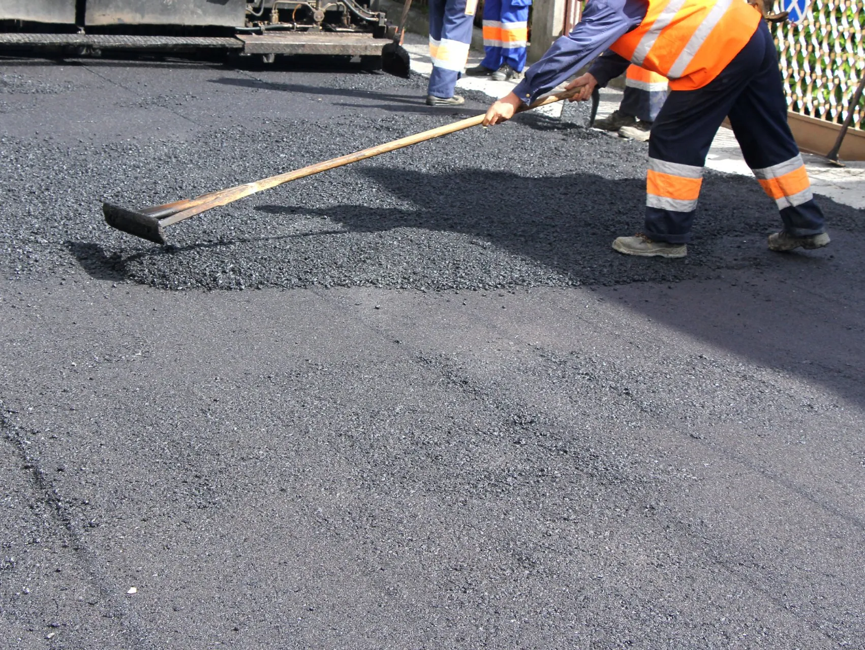 Contractor performing asphalt patch in Jacksonville