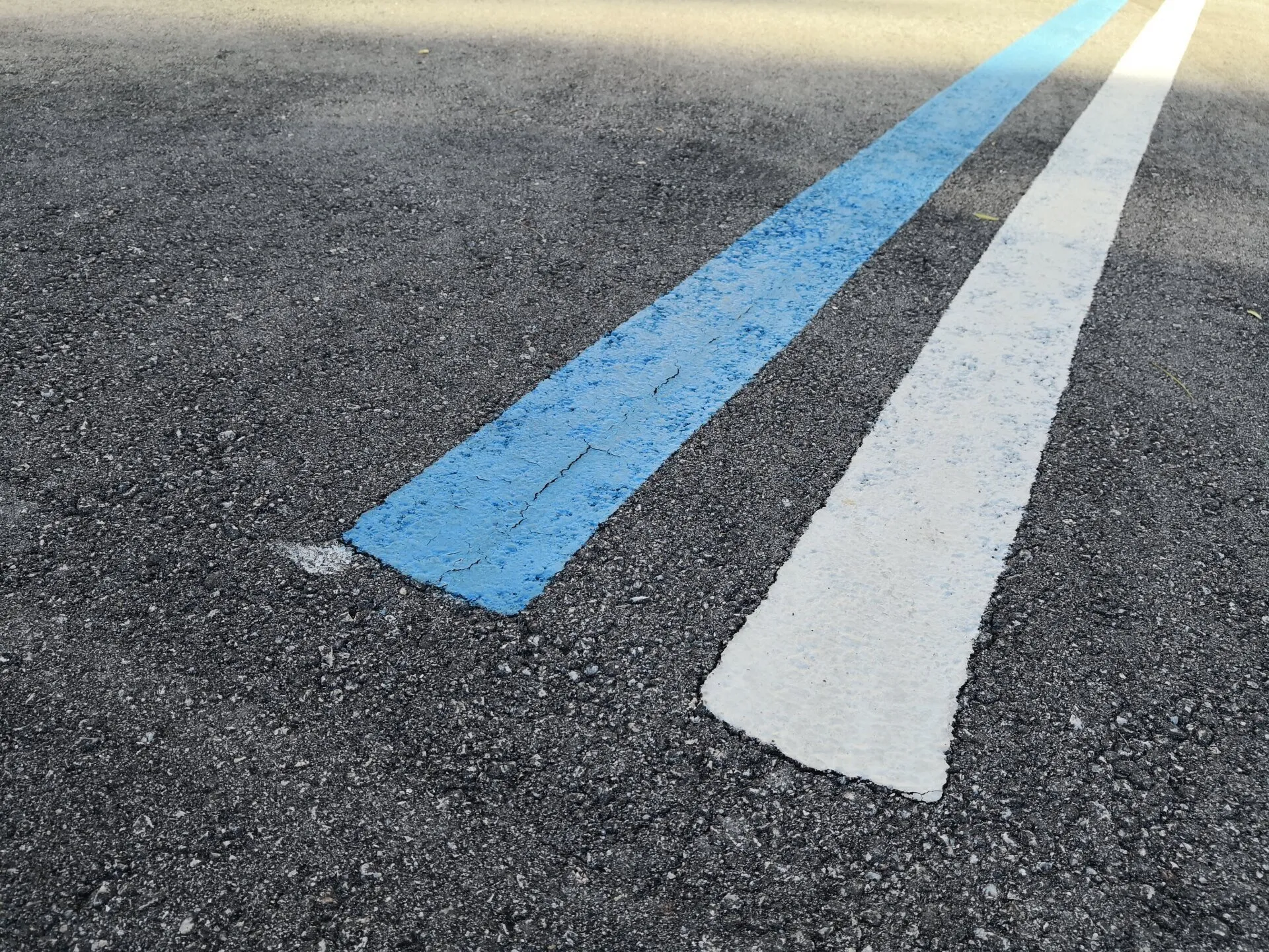 Asphalt lines painted on a disabled parking spot in Jacksonville FL