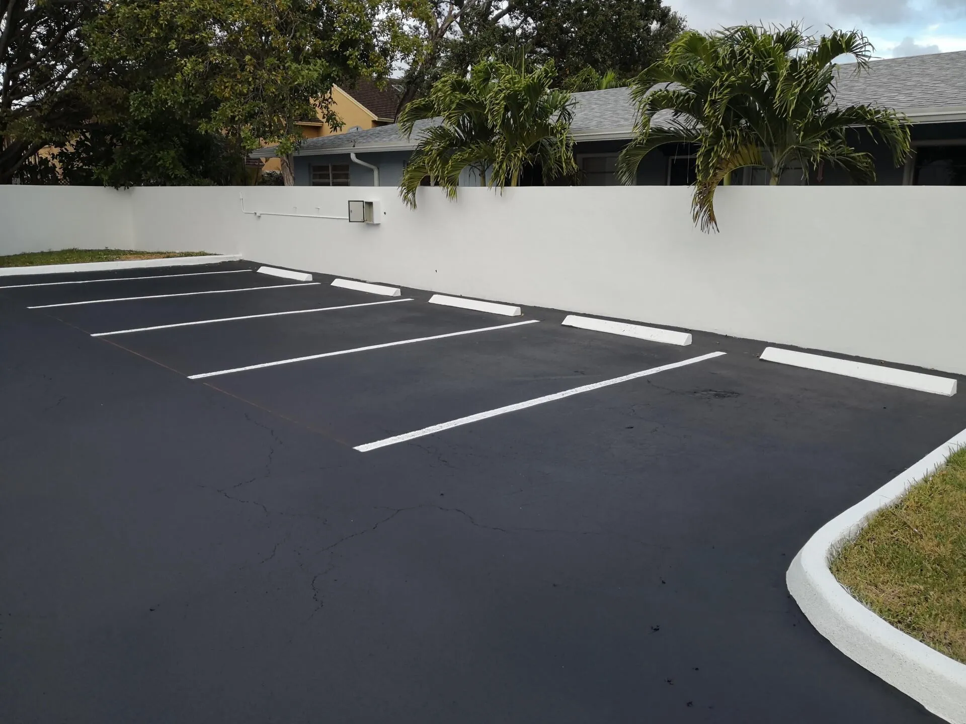 parking lot freshly sealcoated and line striped